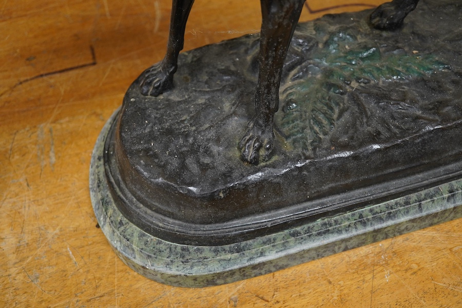 After Jules Moigniez (1835-1894), a cast bronze of a pointer with a pheasant, 60cm wide. Condition - good